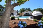 Backyard views of pool & lounge chairs